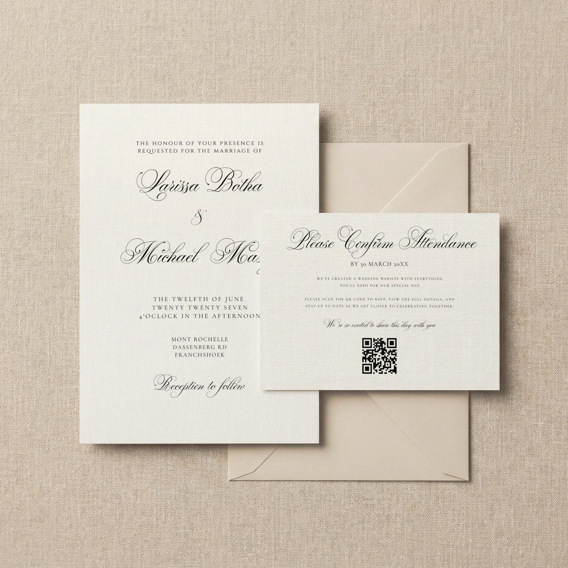 A classic wedding invitation suite featuring an off-white main invitation card, a smaller confirmation card with a QR code, and two matching envelopes, arranged on a textured beige fabric background.